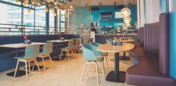 Colorful and modern interior of the food lounge "The Bowl" near Munich.