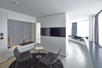 Bright living area in one of the hotel room suites in Munich.